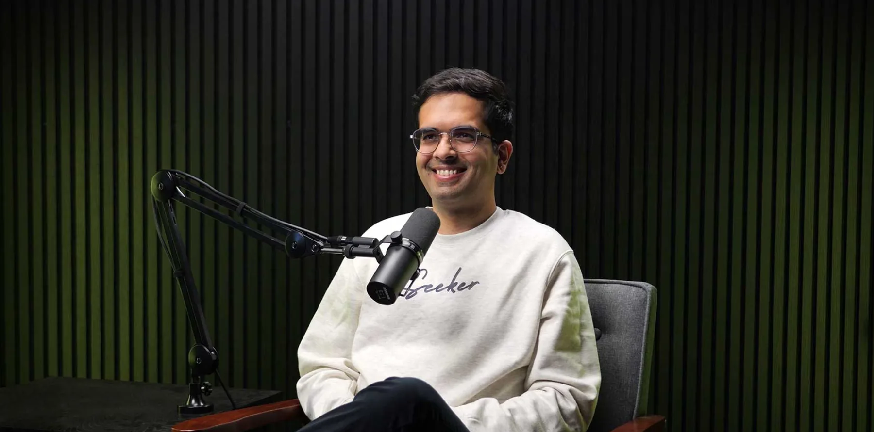 Podcast host in a recording studio